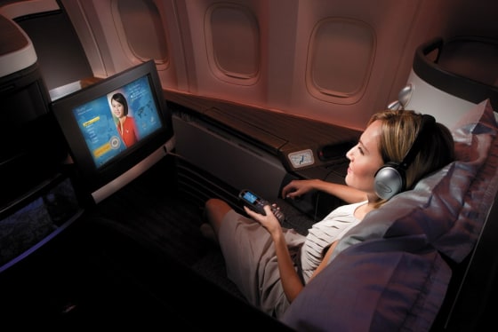 First class on Cathay Pacific is more of a suite than a seat (which converts into a lie-flat bed). There are privacy screens. and duvets, pillows and sleepsuits are available.